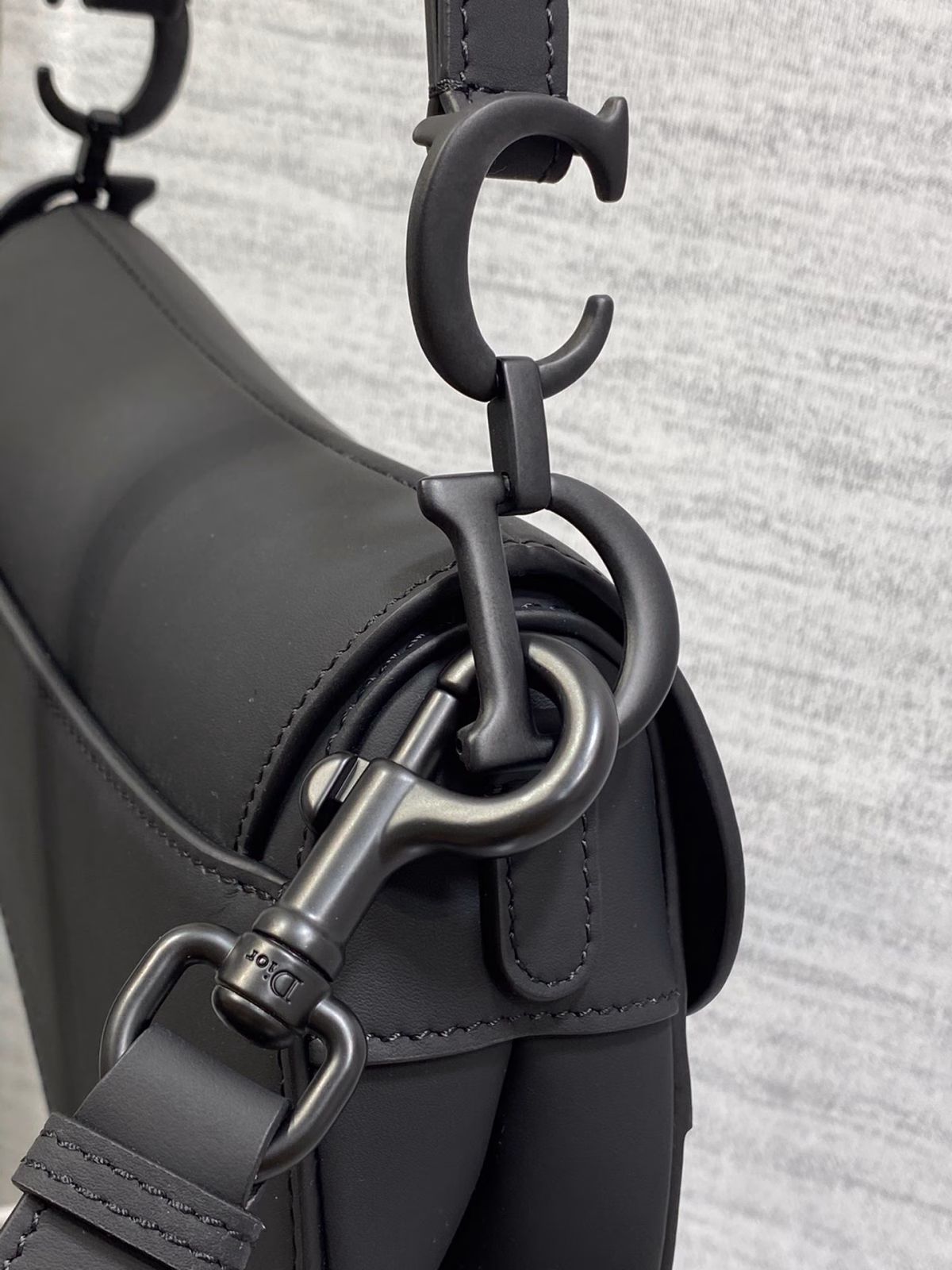 Dior Mini Saddle Bag with Strap in Black Ultramatte Calfskin - Image 9
