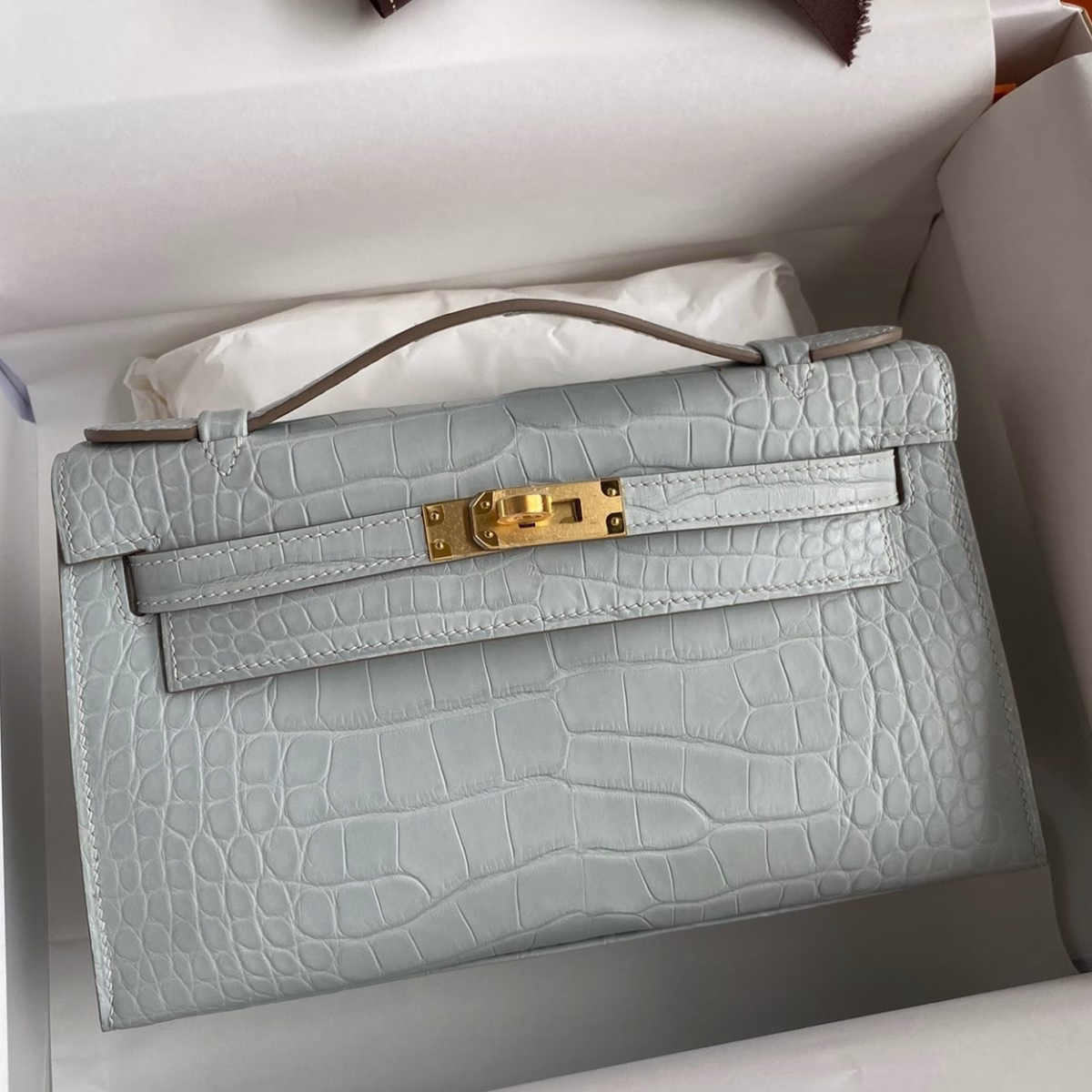 Hermes Kelly Pochette Handmade Bag In Pearl Grey Matte Alligator Leather - Image 1