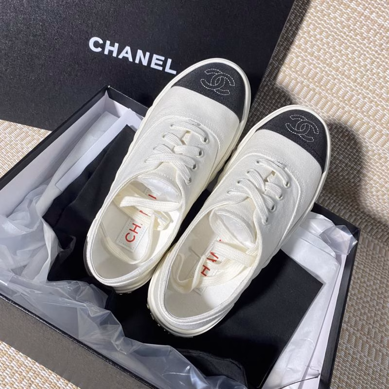1 CHANEL Lace-Up White Sneakers - Image 1