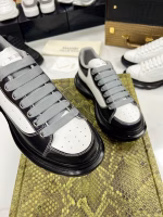 Alexander McQueen Classic White Sneakers with Black Soles - Image 5