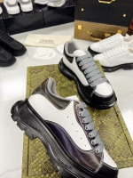 Alexander McQueen Classic White Sneakers with Black Soles - Image 4