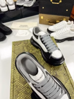 Alexander McQueen Classic White Sneakers with Black Soles - Image 3