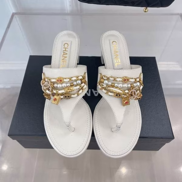 7 Chanel 2022 Pendant Pearl Chain Flip-Flop Sandals - Image 1