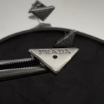 𝐏𝐑𝐀𝐃𝐀 Inverted Triangle Earrings - Image 2