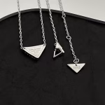 𝐏𝐑𝐀𝐃𝐀 Triangle Logo Necklace - Image 7