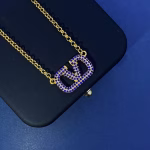 Valentino's new blue colored diamond-encrusted letter V personalized necklace - Image 4