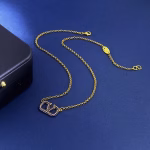 Valentino's new blue colored diamond-encrusted letter V personalized necklace - Image 5
