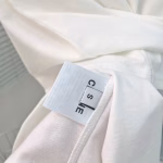 CELINE Black and White Contrast Color Flocked Letter Short-sleeve T-shirt - Image 9