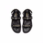 Valentino Garavani Rockstud Flat Sandal In Nappa Leather For Woman In Black