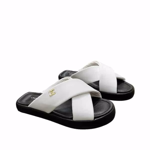 xr:d:DAFeWWAVbBU:26,j:44052866315,t:23032704 Chanel Cc Logo Criss Cross Slides White - Image 1
